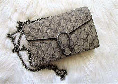 gucci dinosaur wallet|Gucci chain wallet.